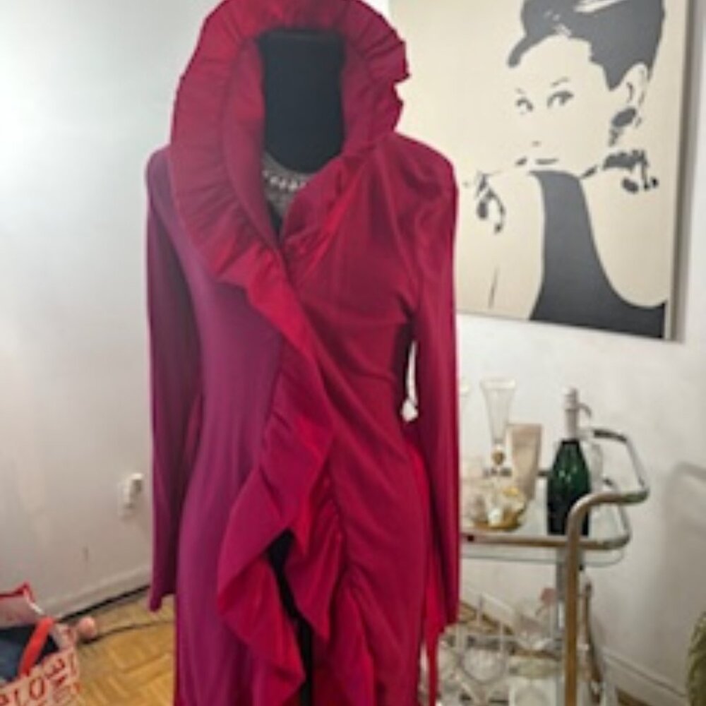 Hot Pink ruffled coat with belt.